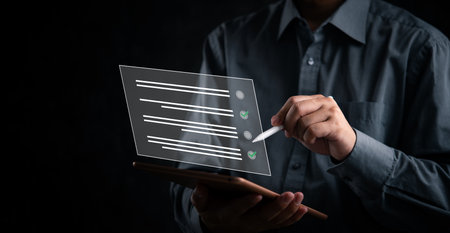 person hand holding pen digital checklist on a tablet with stylus. technology working data network or signature online electroniの写真素材