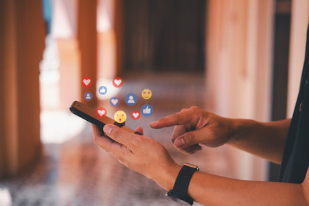 Man with smartphone showing social media likes, concept of online network connection digital...
