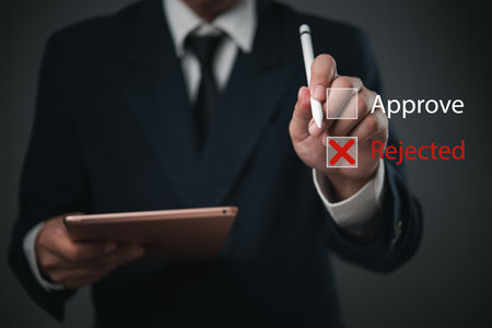 Businessman in suit making a decision with digital tablet, selecting approve or reject options. Professional corporate evaluation, management process. Decision-making, workflow.の写真素材