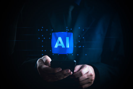 Businessman using smartphone with floating AI icon, representing artificial intelligence integration into mobile technology and business applications. Ideal for AI innovationの写真素材