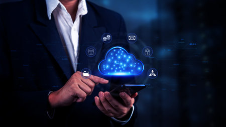 businessman using a smartphone to interact with a digital cloud interface, cloud computing, and data...