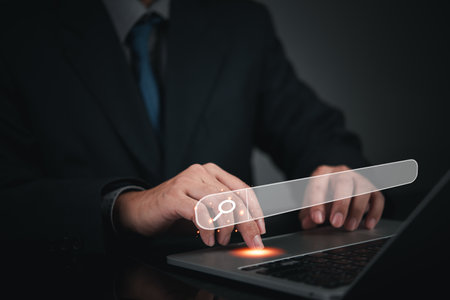 person typing on a laptop, representing online research, SEO strategies, and web optimization. digital marketing, search engine tools, and website traffic improvement and online business growth.の写真素材