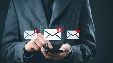 Email notifications and alert icons on phone mobile email overload and digital risk. business...