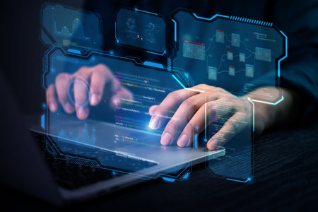 Close-up of hands coding programmer works on a laptop with futuristic cybersecurity interface,...