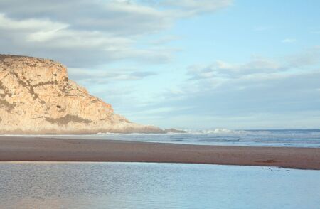 Mountain blue sky and beach landscape, ideal vacation destinationの写真素材