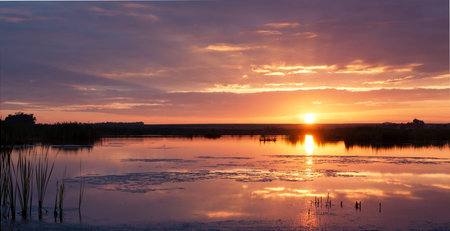 Peaceful sunrise over a dam with pastal colors