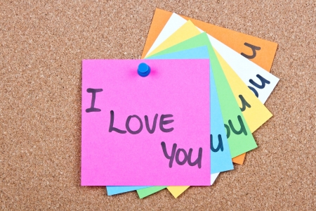 Post it notes on wood collage with I love youの写真素材