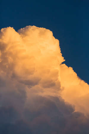 Thunder storm clouds approack in blue sky late afternoonの写真素材