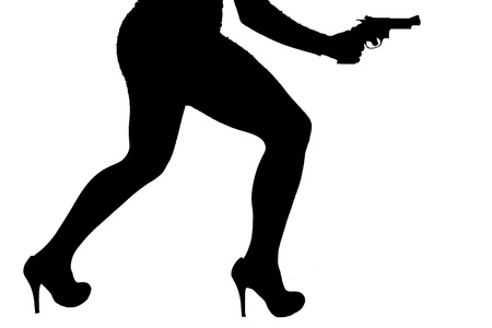 Legs of dangerous woman with handgun and black shoes stockings silhouette の写真素材