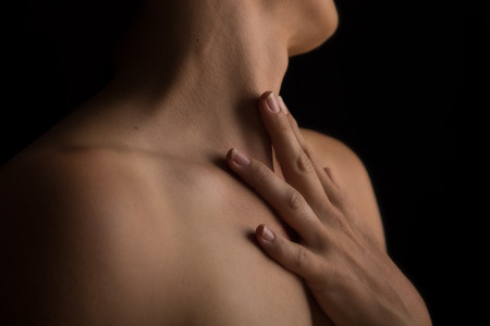 Body scape of woman neck and hand with emotionの写真素材