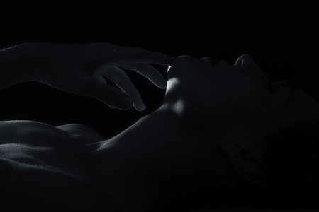 Body scape of woman neck and hand with emotion artistic conversionの写真素材