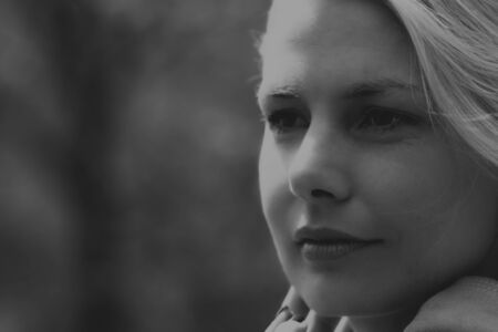Close-up of a blond woman face in a duotone artistic conversionの写真素材