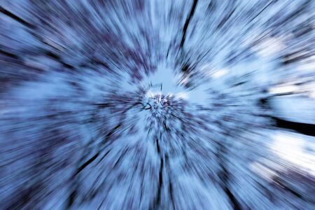 Blue Jacaranda trees in bloom with a zoom warp lens motion distortion effectの写真素材