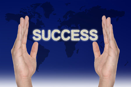 Success in hand , successful business ideaの写真素材