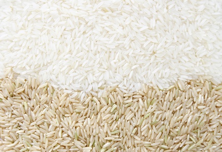 white rice and brown rice background texture の写真素材