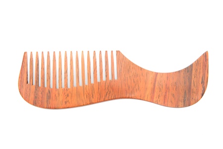 wooden comb isolated on white backgroundの写真素材