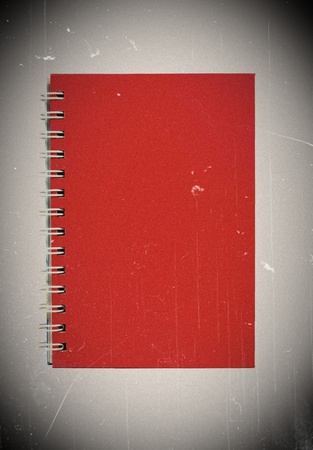 Old red notebookの写真素材