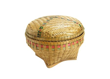 wicker basket isolated on white backgroundの写真素材