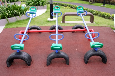 small children playground on the parkの写真素材