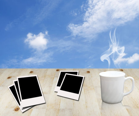 blank photo and cup of coffeeの写真素材