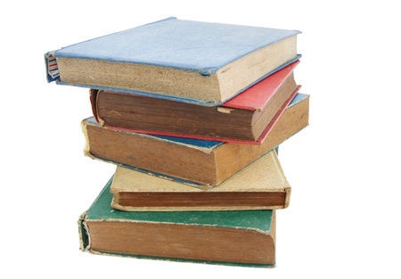 Pile of old books isolated on white backgroundの写真素材