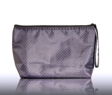 handbag on reflect floor and white backgroundの写真素材