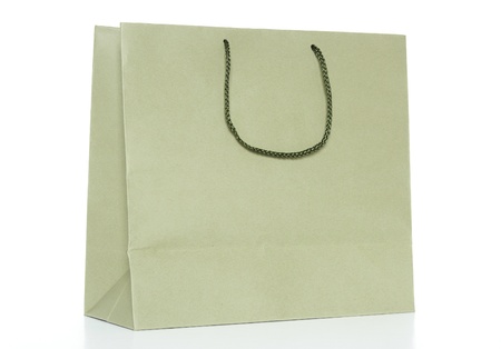 brown shopping bag on reflect floor and white backgroundの写真素材