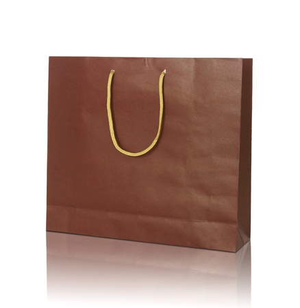 red shopping bag on reflect floor and white backgroundの写真素材