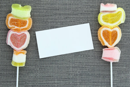 Colorful jelly candy stick and white paper label