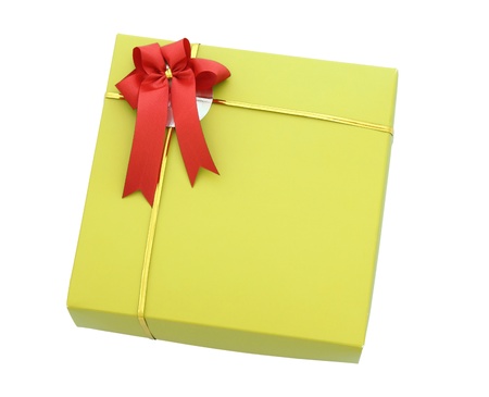 Gold gift box with red ribbon bow isolated on white with clipping pathの写真素材