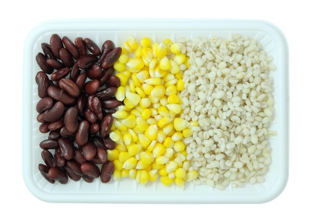 Cereal grains and seeds in the package isolated on whiteの写真素材
