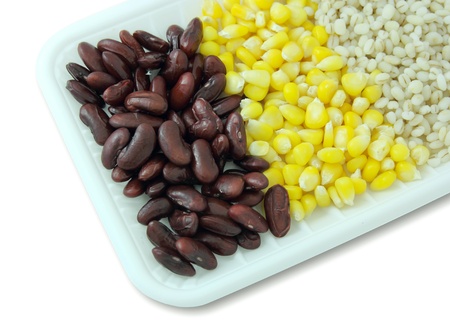 Cereal grains and seeds in the package isolated on whiteの写真素材