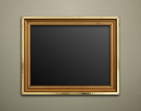 Empty golden vintage frame on wallpaper backgroundの写真素材