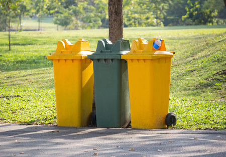 recycle bins in the parkの写真素材
