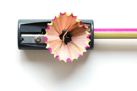pencil with sharpening shavings on white backgroundの写真素材