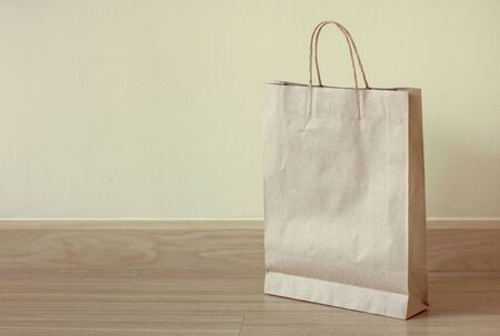 brown paper bag on the floorの写真素材