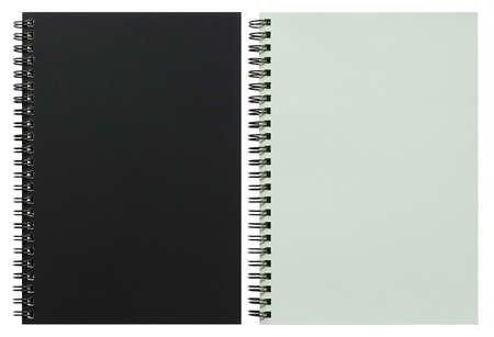 black and white spiral notebook isolated on white with clipping pathの写真素材