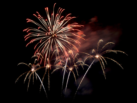 fireworks in the dark sky backgroundの写真素材
