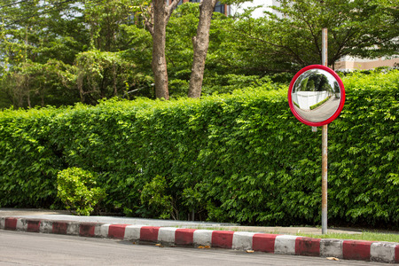 traffic convex mirror at corner of streetの写真素材