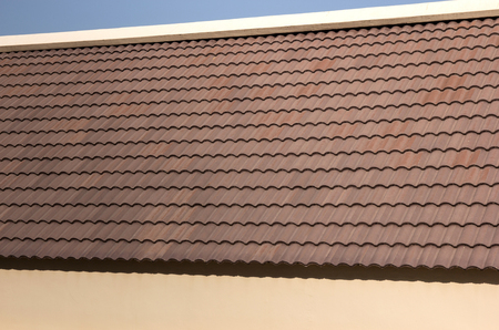 Red tiles on roof houseの写真素材