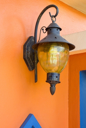 vintage lamp light on the orange wallの写真素材