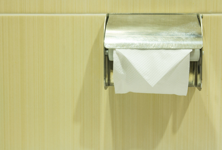 tissue paper or toilet paper on the wallの写真素材
