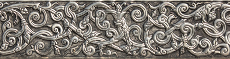 Pattern of silver metal plate with flower carved background, Thai style in templeの写真素材