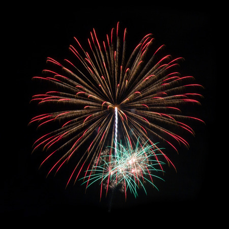 fireworks in the dark sky backgroundの写真素材