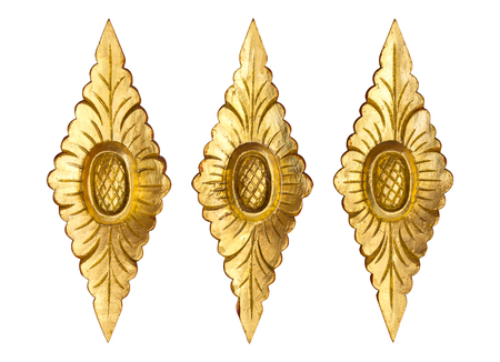 Pattern of gold wood carved flower isolated on white background. Traditional Thai style patternの写真素材