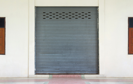 shutter door or rolling door, old corrugated metal sheetの写真素材