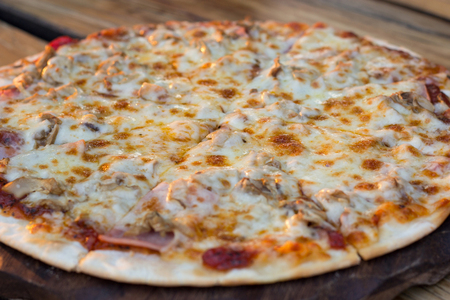 Pizza with Ham and Mushroomの写真素材