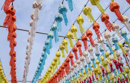 colorful hanging lanterns lighting in loy krathong festival at northern of thailandの写真素材