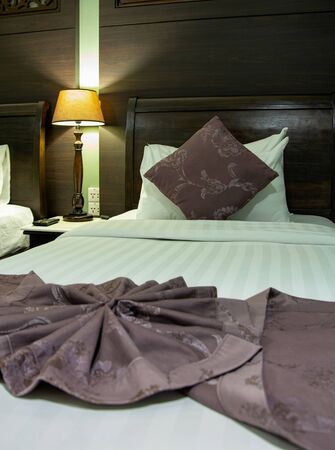 Bedroom Interior with Pillow and Table Lampの写真素材
