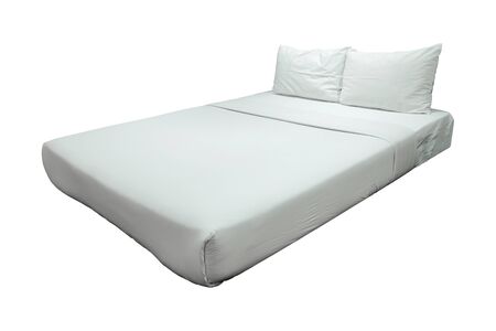 White Bedding and Pillow Isolated on White Background with Clipping Pathの写真素材